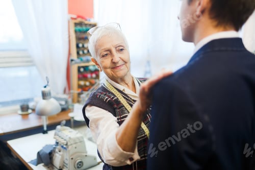 Preview: Professional Seamstress Fitting a Suit Jacket