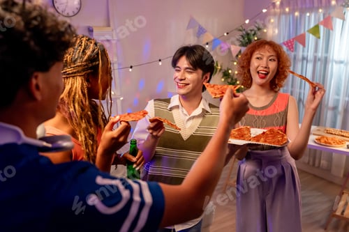 Preview: Group of diverse Generation Z friends enjoying a party in cozy house.