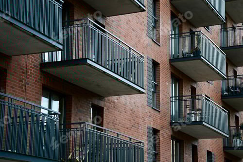 Preview: Facade of residential building with balconies