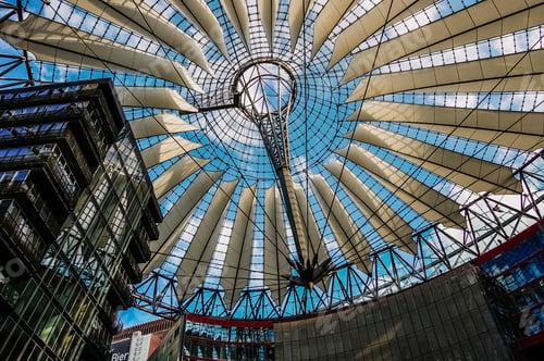 Preview: Berlin, Germany - June 7, 2019: Interior of Sony Center's modernist-style shopping center