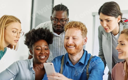 Preview: Young people having a meeting in the office