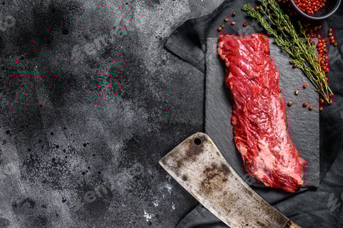 Preview: Raw skirt, machete steak with pink pepper and thyme. Black background. Top view. Copy space