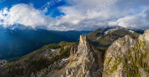 Preview: Aerial Canadian Mountain Landscape. Sunny Cloudy Day. BC, Canada. Nature Background