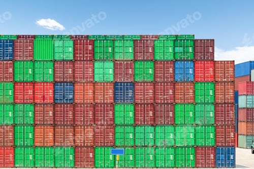 Preview: shipping containers against a blue sky