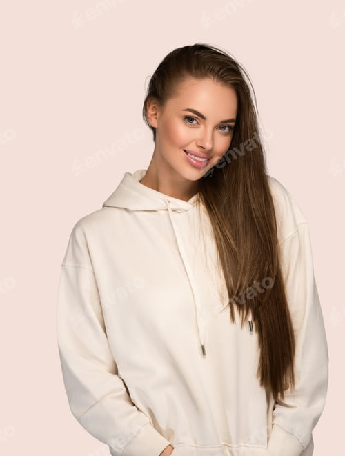 Preview: Woman portrait casual sport style natural studio female long smooth hair color background pink