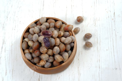 Preview: kacang bogor or Bambara groundnut or Vigna subterranea in wooden bowl on table top
