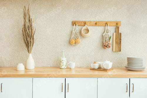 Preview: Interior of kitchen in rustic style. White furniture and wooden decor in bright cottage indoor