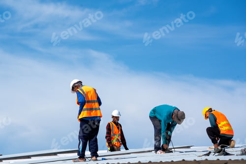 Preview: Roofing,Construction workers wearing safety harness checking and installation assembly of new roof.