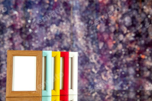 Preview: front view different picture frames with colored corners on bright purple background color picture