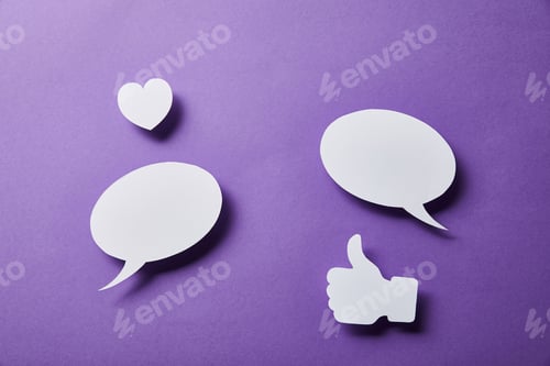 Preview: white speech bubbles, thumbs up card and small paper heart on purple surface