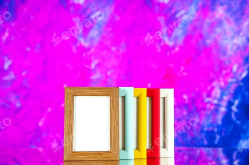 Preview: front view different picture frames with colored corners on light pink background photo portrait