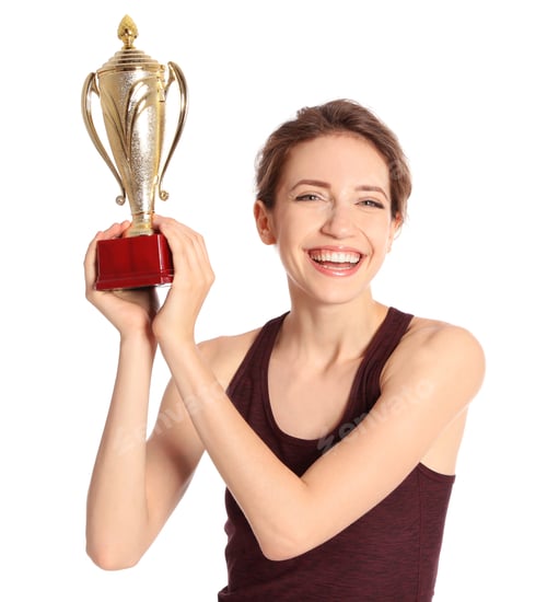 Preview: Portrait of happy young sportswoman with gold trophy cup on white background