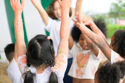 Preview: Children have fun playing with colors. They are holding hands