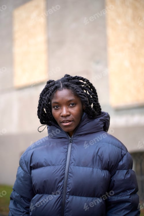 Preview: Adult woman with braided hair wearing a puffy jacket outdoors, Brandenburg, Germany