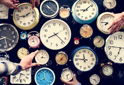 Preview: Hands holding clocks