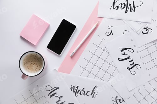 Preview: flat lay with calendar, smartphone, cup of coffee and sticky notes isolated on white