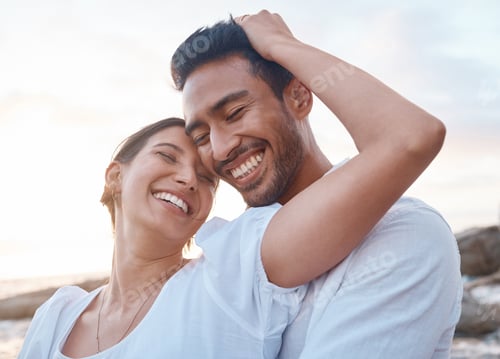Preview: Being with you feels amazing. Shot of a young couple spending time together at the beach.