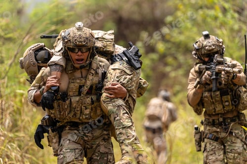 Preview: Soldier Carrying Injured Comrade During Tactical Combat Mission