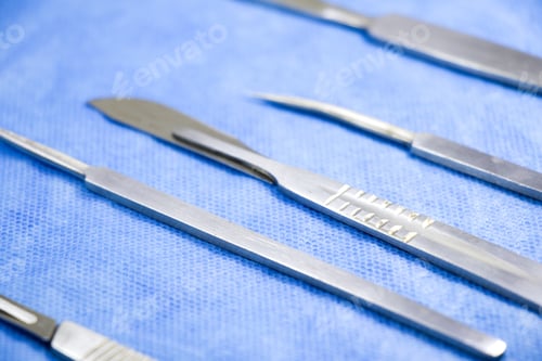 Preview: Closeup of a dissection kit on the table in the hospital under the lights
