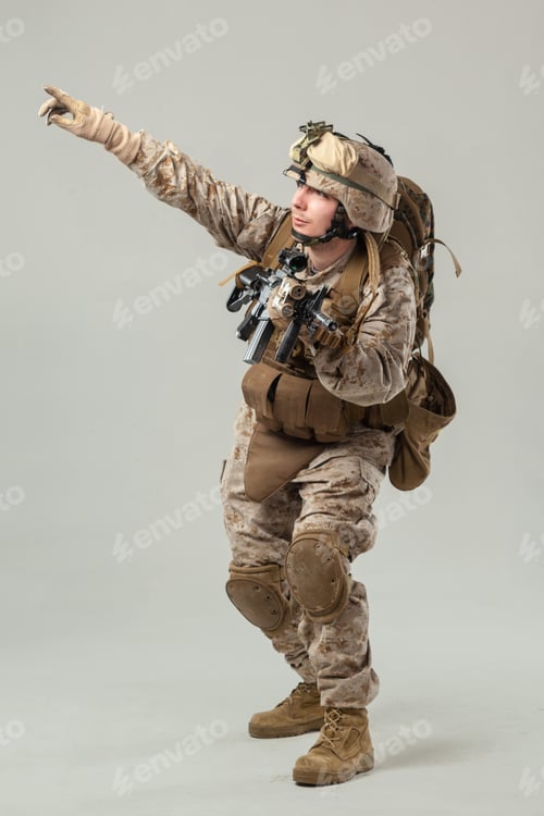 Preview: Soldier in tactical gear directs a team during a training exercise in a neutral setting