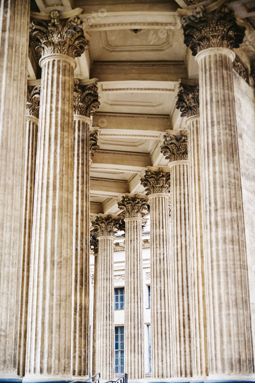 Preview: Classic corinthian colonnade captured from low perspective with soft natural lighting