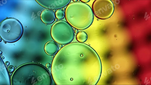 Preview: Abstract Colorful Food Oil Drops Bubbles and spheres Flowing on Water Surface
