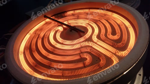 Preview: Closeup of a hot electric kitchen induction burner