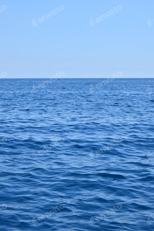 Preview: Seascape with water ripples and clear blue sky