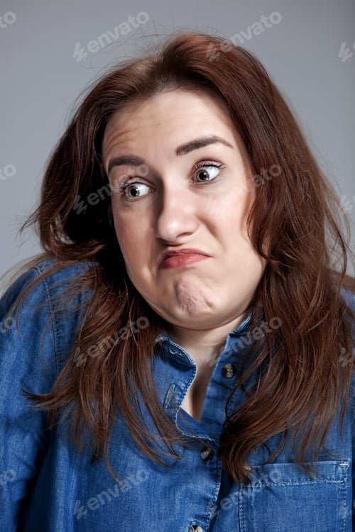 Preview: Portrait Of Young Woman With Shocked Facial Expression