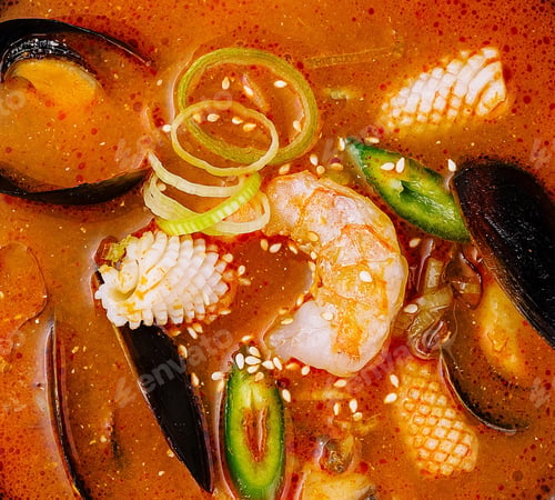 Preview: Spicy seafood soup close up background