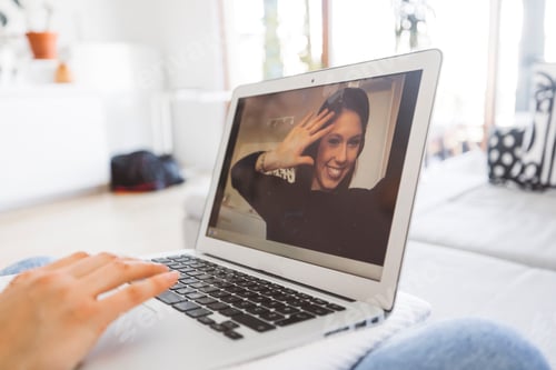 Preview: Young female student having a video online lesson