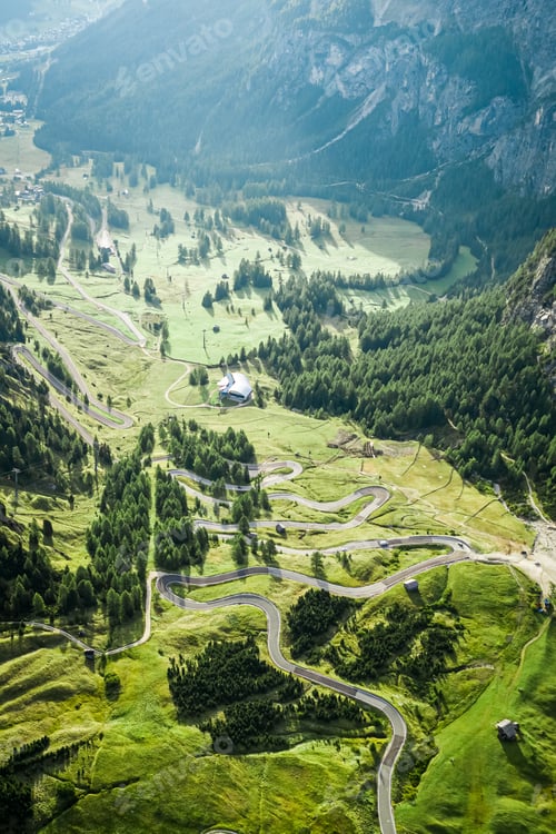 Preview: Aerial view of winding road at Passo Gardena in Dolomites