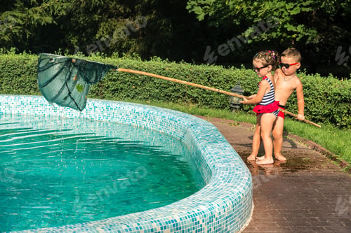 Preview: Children Clean The Pool Of Leaves