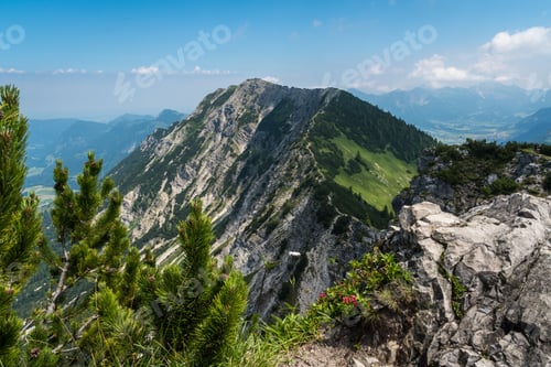 Preview: Landscape shot of a beautiful mountain peak in the daylight - perfect for background