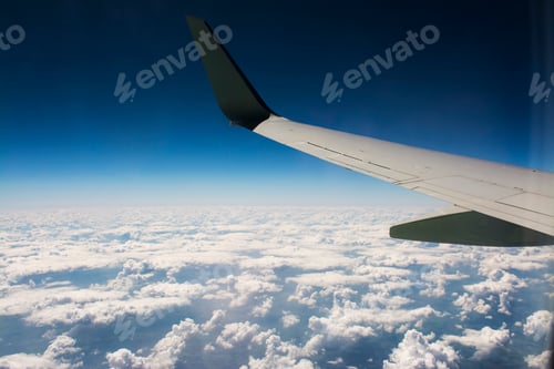 Preview: Airplane wing in the sky