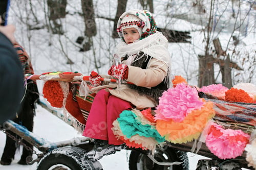 Preview: Happy kids in traditional Ukrainian dresses during Christmas holidays