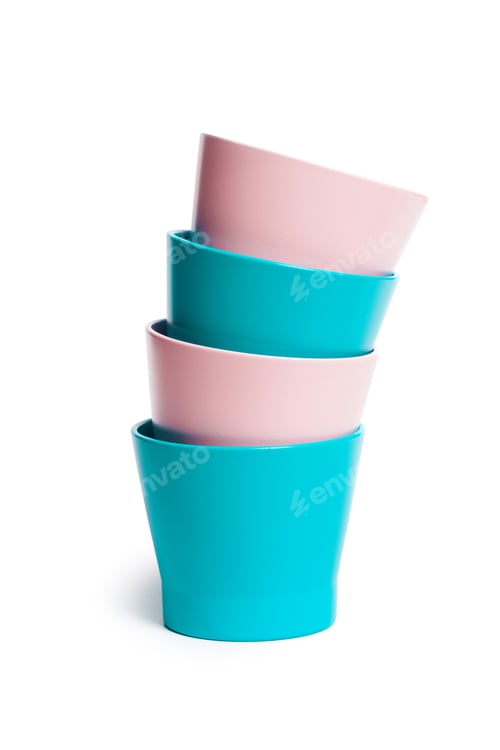Preview: Brightly colored plant pots stacked creatively for an appealing display