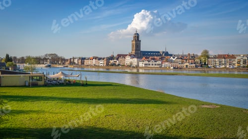 Preview: Scenic view of the town of Deventer along a river in the Netherlands
