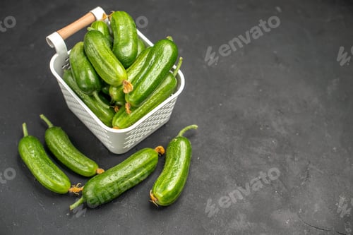 Preview: front view fresh green cucumbers inside basket on a dark background food health photo salad meal