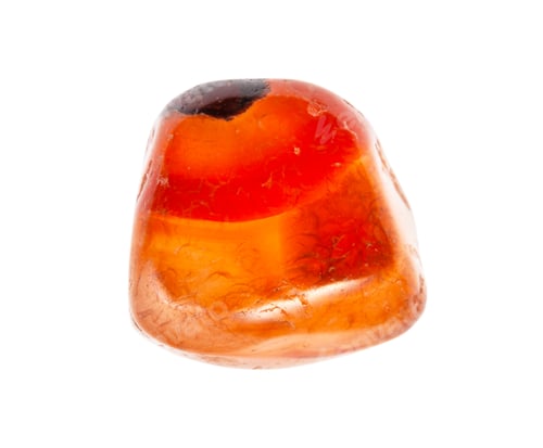 Preview: rolled Carnelian (cornelian) gem isolated on white