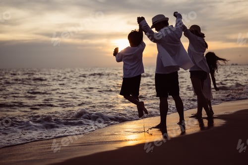 Preview: Happy Asian family travel on beach on holiday