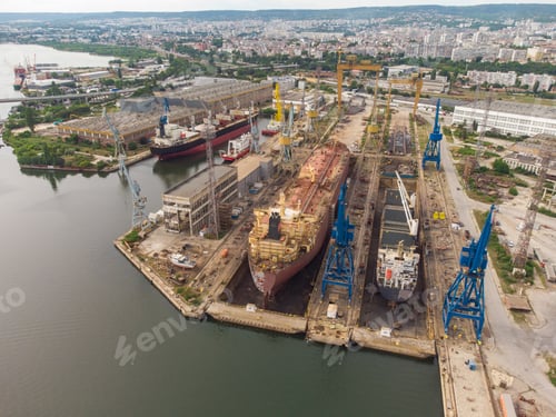 Preview: Tanker vessel repair in dry dock Shipyard, aerial view