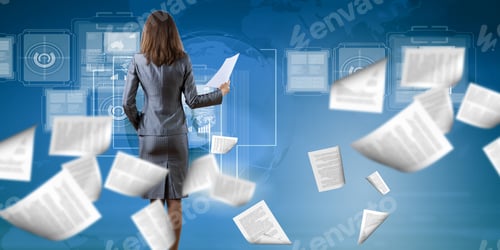 Preview: Back View Of Businesswoman Holding Papers In Hands