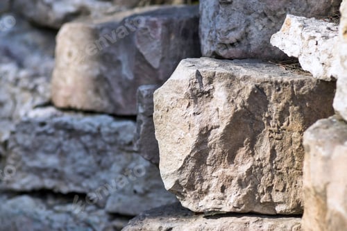 Preview: Big Piece Of A Stone Closeup On An Indistinct Background From Other Stones
