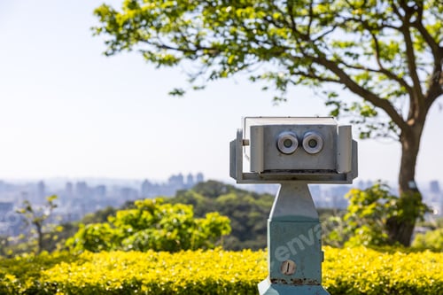 Preview: Binoculars on mountain top for sightseeing view