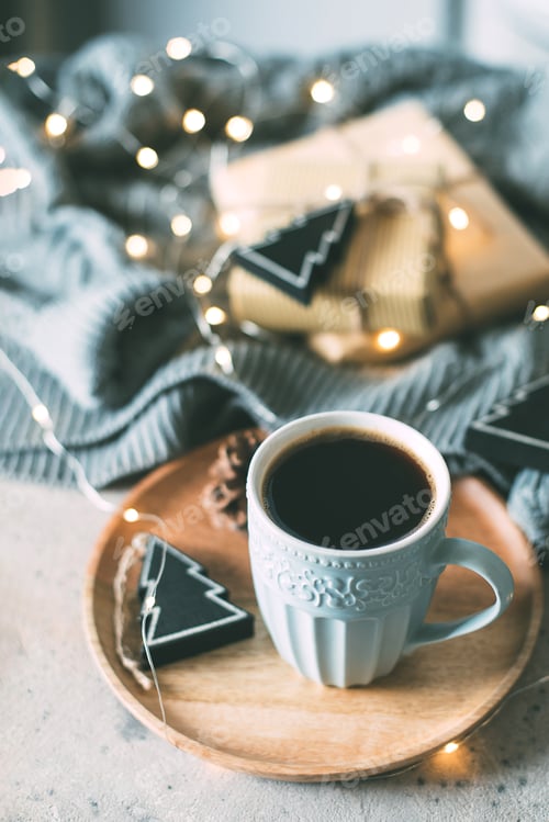 Preview: Cozy, mood, lifestile, still life concept. Cop of coffee and decor. New Year 2021 holiday concept.
