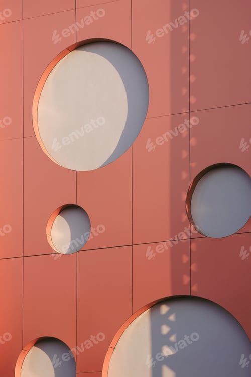 Preview: Abstract background of circle pattern on brown aluminum composite tile wall of modern building