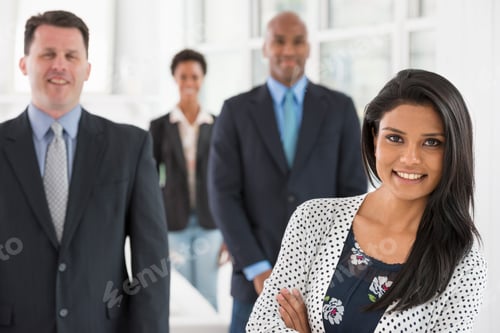 Preview: Business people. A team of people, a department or company. Two men and two woman.