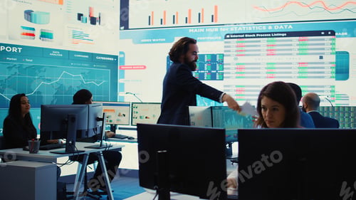Preview: Pleased general director showing statistics data flyers to his team