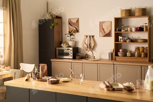 Preview: Modern Kitchen Interior Featuring Wooden Countertop and Baking Ingredients